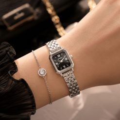 ساعت زنانه نایدو O رنگ مشکی صفحه مستطیل بند فلزی کد W563