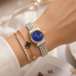 ساعت زنانه رولکس دیت جاست Oyester Perpetual نقره‌ای طلایی صفحه آبی کد W1182