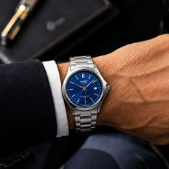 Alternative view of ساعت کلاسیک مردانه فلزی کاسیو Casio صفحه دایره‌ای گرد رنگ سیلور - آبی (e) کد 8210XL-QM