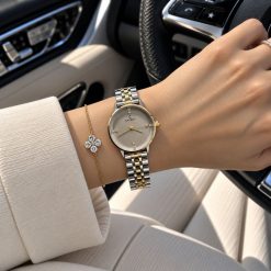 ساعت زنانه کاونت گرد نقره ای طلایی صفحه طوسی (ZZ) کد W1697